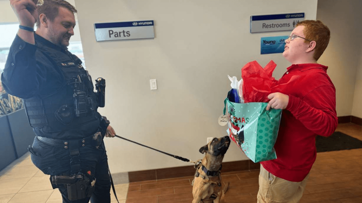 Police dog Anya receiving her gift bag