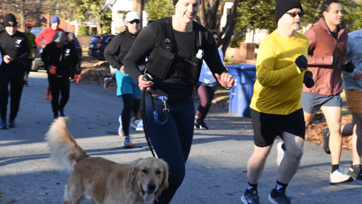 Woman and Dog ALEX HICKS JR.STAFF